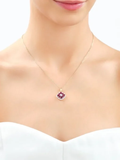 Zawieszka z żółtego złota z diamentami i rodolitami - próba 585