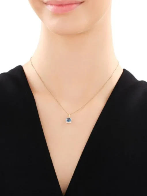 Zawieszka z żółtego złota z diamentami i topazem London Blue - próba 585