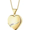 Zawieszka z żółtego złota z diamentami - puzderko - serce - 0,01 ct - próba 375