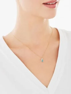 Zawieszka z żółtego złota z diamentem i topazem - próba 585