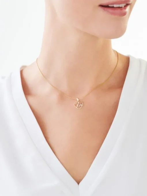 Zawieszka z żółtego złota z diamentem - litera W, serce - 0,005 ct - próba 375