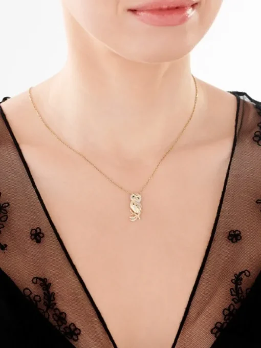 Zawieszka z żółtego złota z diamentami - sowa - 0,13 ct - próba 585