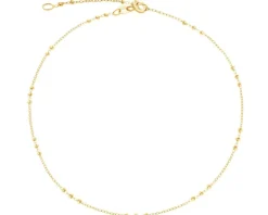 Złota bransoletka na nogę - kulki