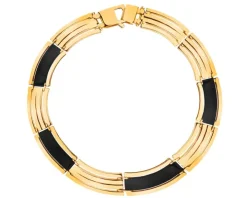 Złota bransoletka z czarnym elementem ozdobnym