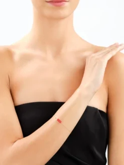 Złota bransoletka z koralem syntetycznym  - serce