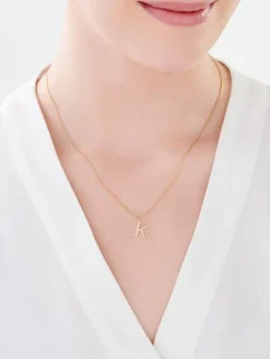 Złota zawieszka - litera K