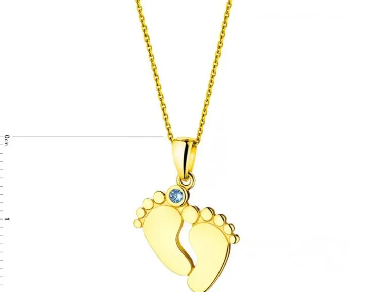 Złota zawieszka z akwamarynem syntetycznym - stópki