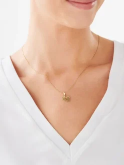 Złota zawieszka z akwamarynem syntetycznym - stópki