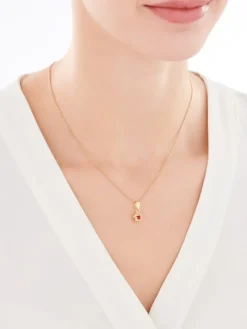 Złota zawieszka z cyrkonią