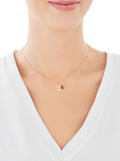 Złota zawieszka z cyrkonią