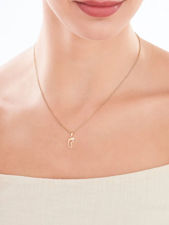 Złota zawieszka z cyrkonią - stópka