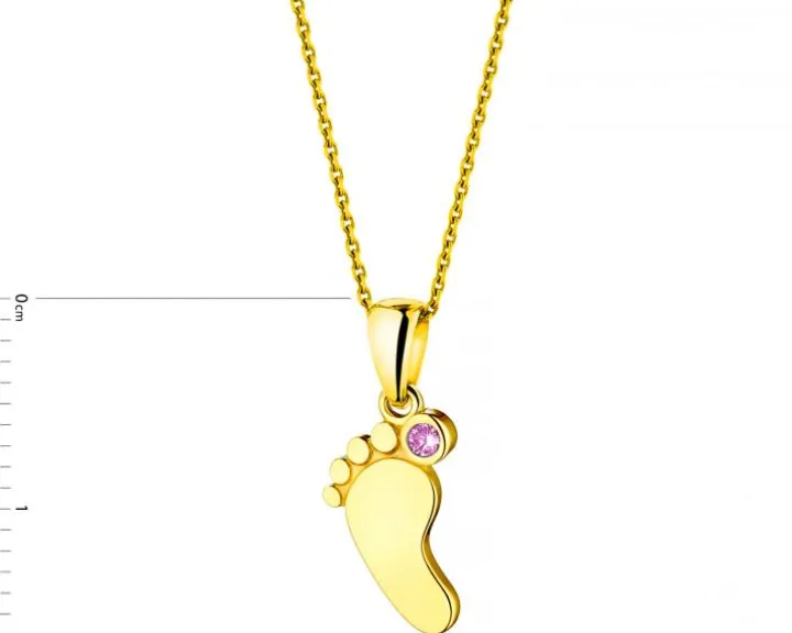 Złota zawieszka z cyrkonią - stópka