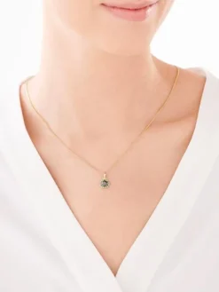 Złota zawieszka z cyrkonią i szmaragdami syntetycznymi