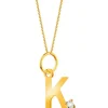 Złota zawieszka z cyrkonią - litera K