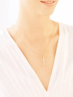 Złota zawieszka z cyrkonią - krzyż