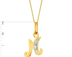 Złota zawieszka z cyrkonią - litera M