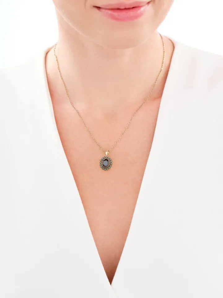 Złota zawieszka z cyrkoniami