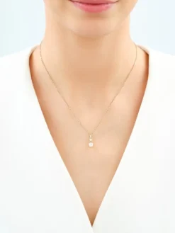 Złota zawieszka z cyrkoniami