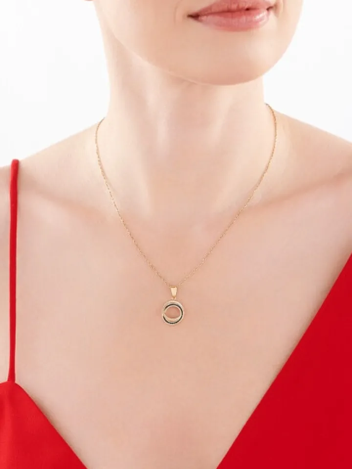 Złota zawieszka z cyrkoniami