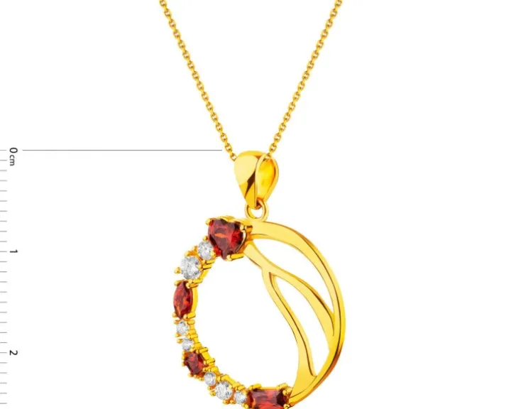 Złota zawieszka z cyrkoniami