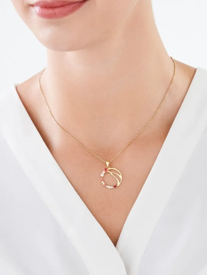 Złota zawieszka z cyrkoniami