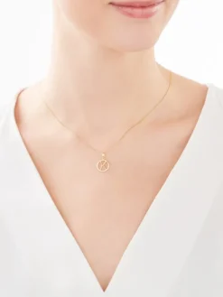 Złota zawieszka z cyrkoniami - Litera K