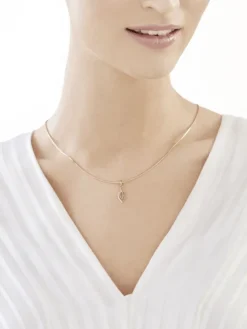 Złota zawieszka z cyrkoniami