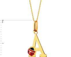 Złota zawieszka z emalią - litera A, biedronka