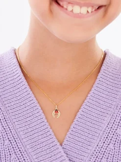 Złota zawieszka z emalią - podkowa, biedronka