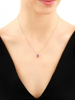 Złota zawieszka z korundem syntetycznym