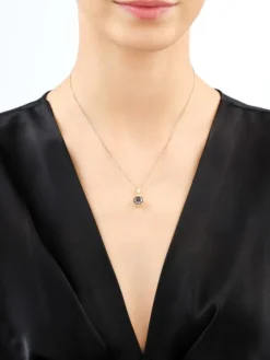 Złota zawieszka z korundem syntetycznym i cyrkoniami