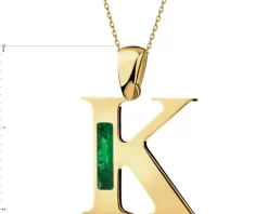 Złota zawieszka z masą malachitową - litera K