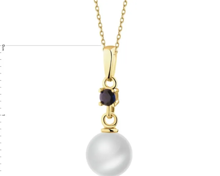 Złota zawieszka z szafirem syntetycznym i perłą