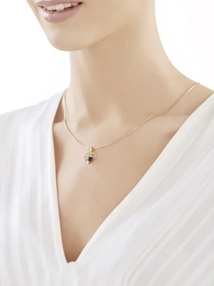 Złota zawieszka z szafirem syntetycznym i cyrkonią - serce